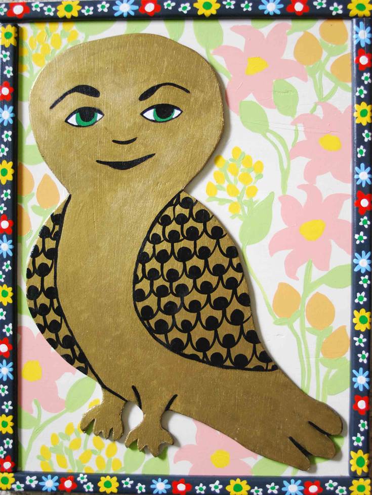 antique gold owl with flowered border for web